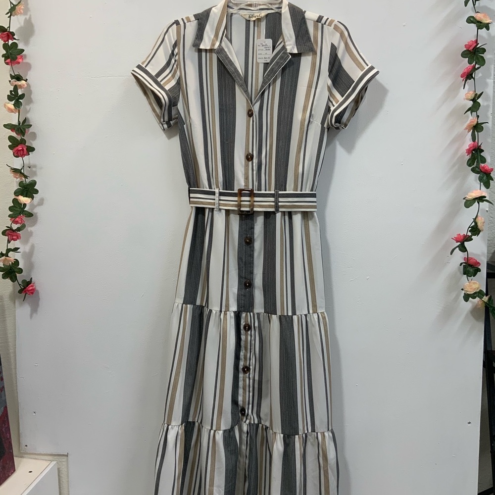 Long dress with white, gray, and beige lines.